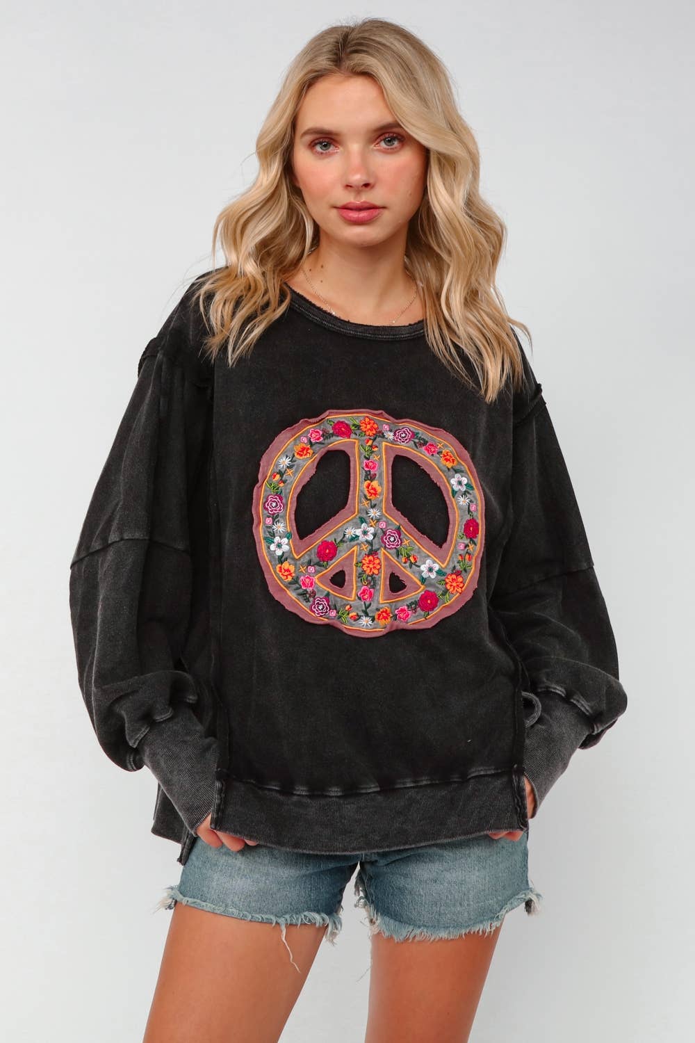 EMBROIDERED PEACE WASHED PULLOVER KNIT TOP