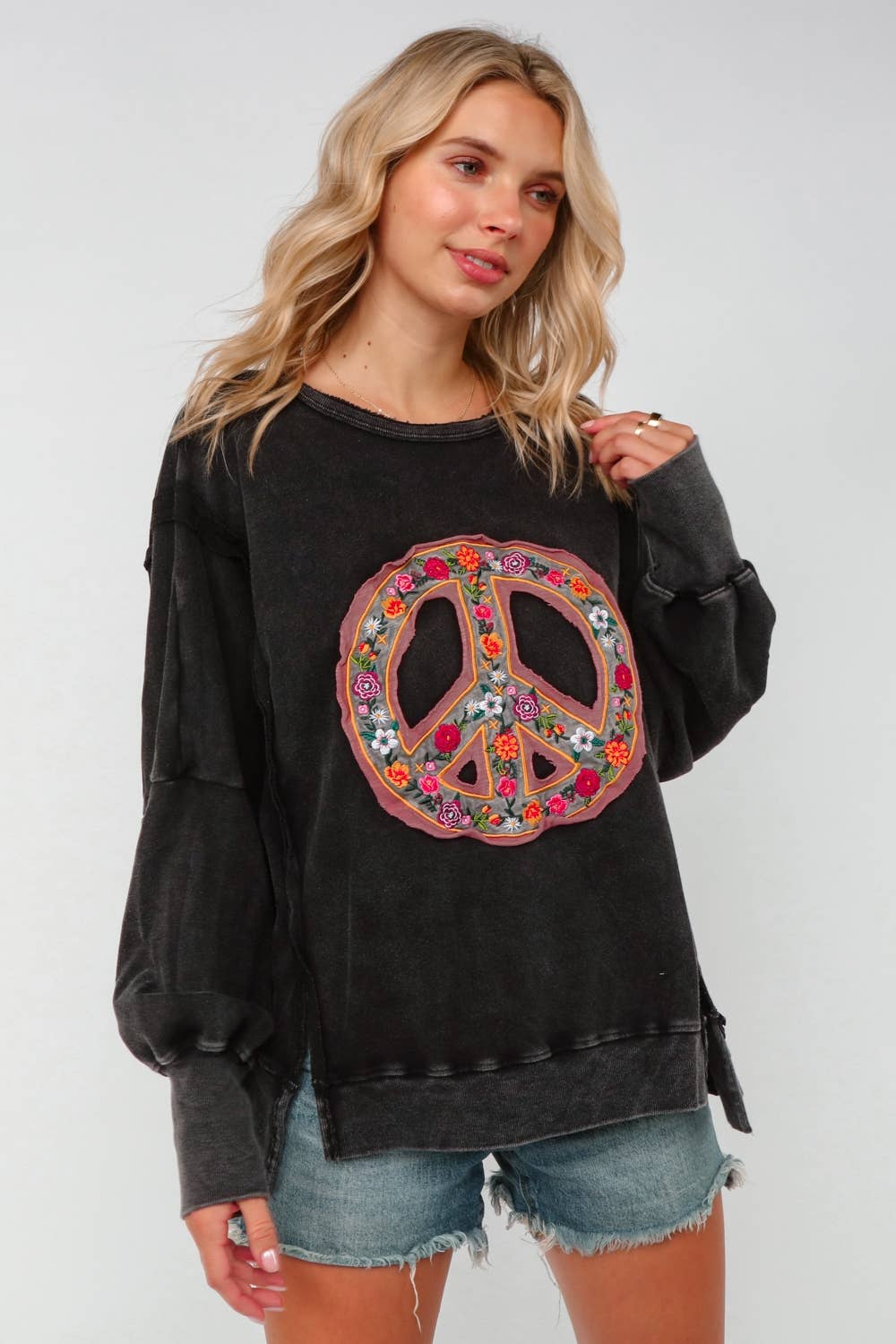 EMBROIDERED PEACE WASHED PULLOVER KNIT TOP