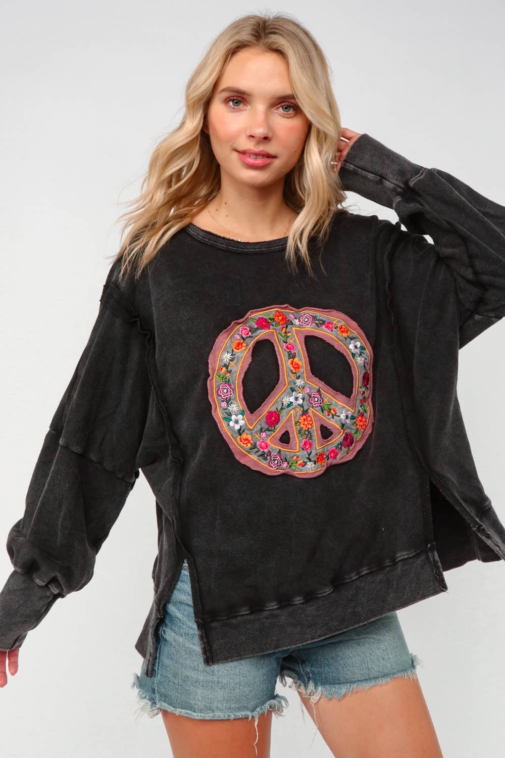 EMBROIDERED PEACE WASHED PULLOVER KNIT TOP