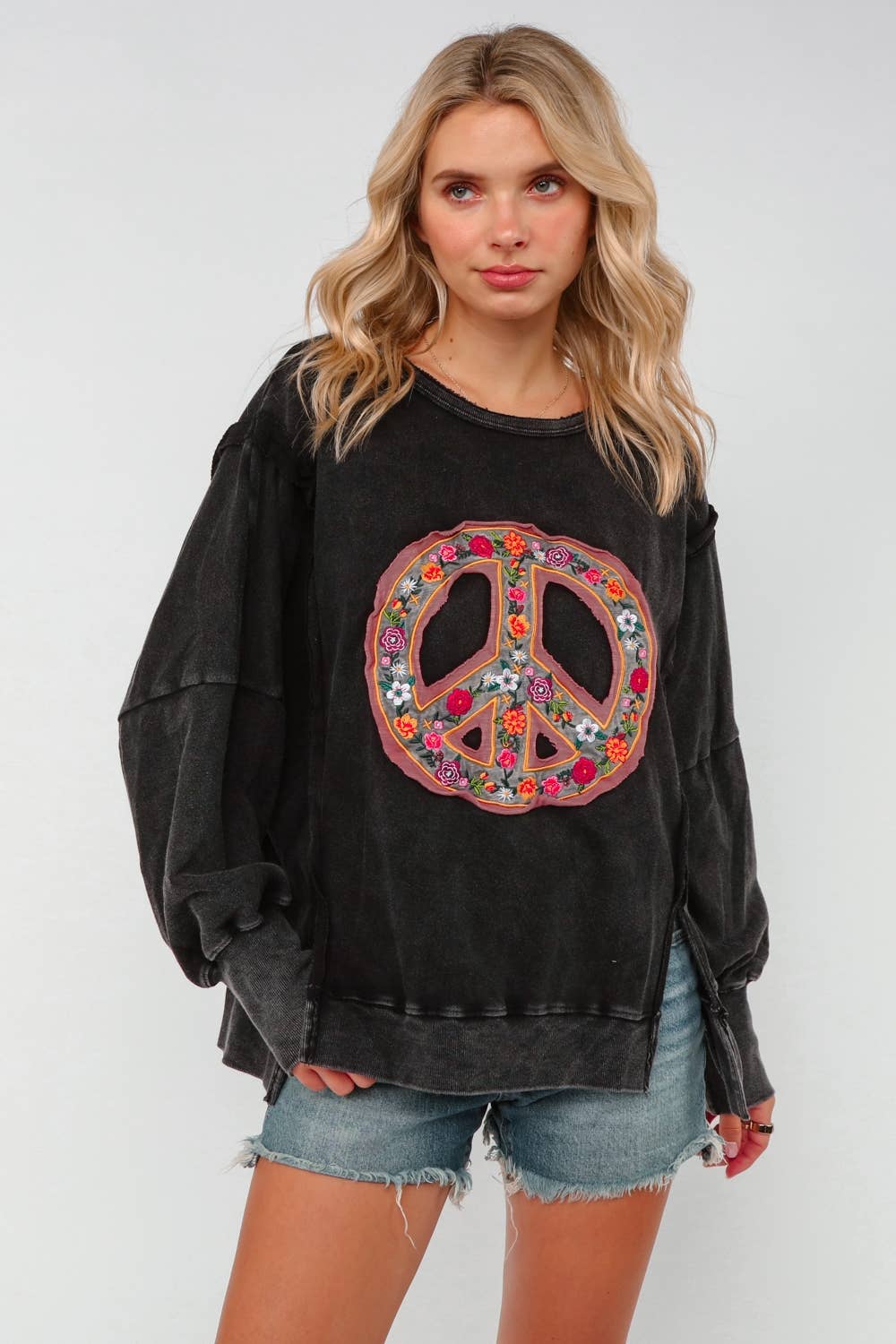 EMBROIDERED PEACE WASHED PULLOVER KNIT TOP