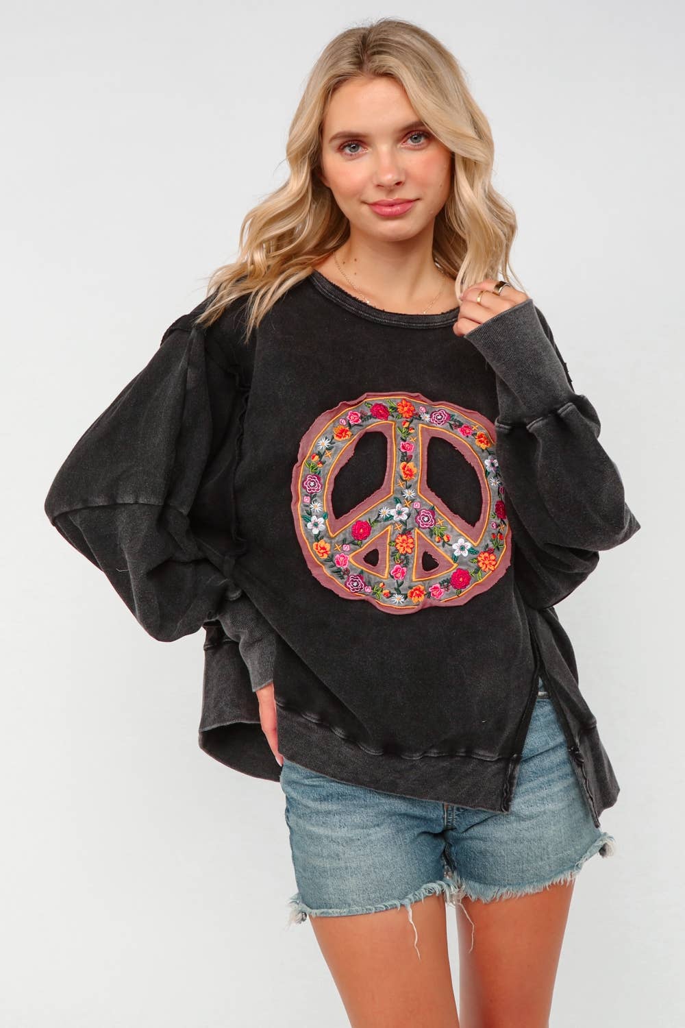 EMBROIDERED PEACE WASHED PULLOVER KNIT TOP