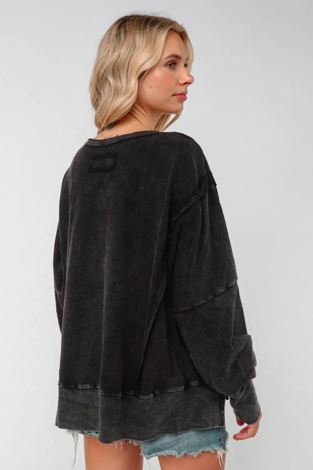 EMBROIDERED PEACE WASHED PULLOVER KNIT TOP